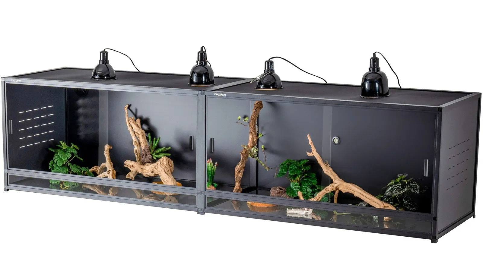 Toxirium dark terrariums with lamps, plants, and driftwood for reptiles.
